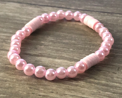 Pink jewelry handmade with pink clay beads