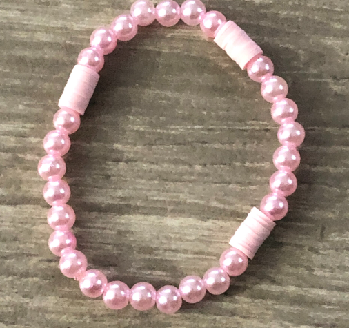 Pink jewelry handmade with pink clay beads