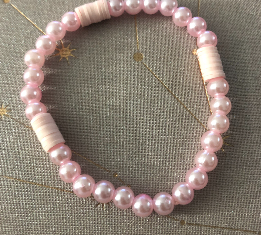 Pink jewelry handmade with pink clay beads