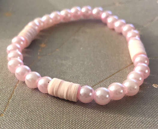 Pink jewelry handmade with pink clay beads