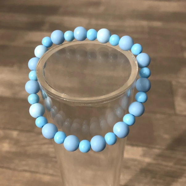 Blue beaded handmade stretch bracelet with round blue beads