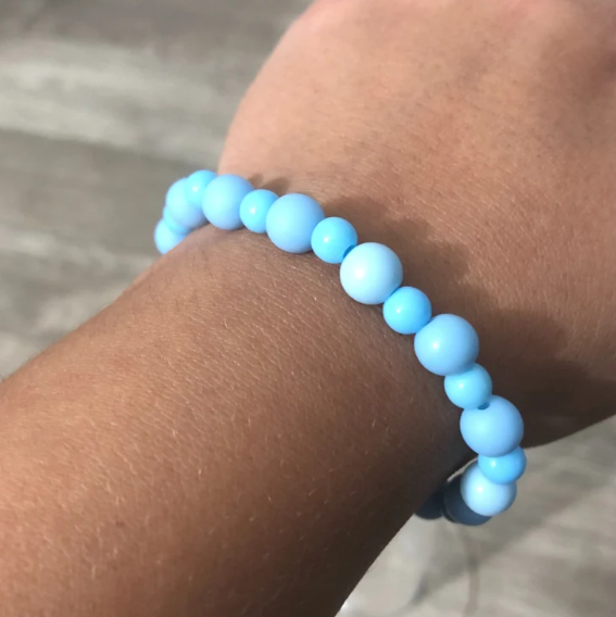 Blue beaded handmade stretch bracelet with round blue beads