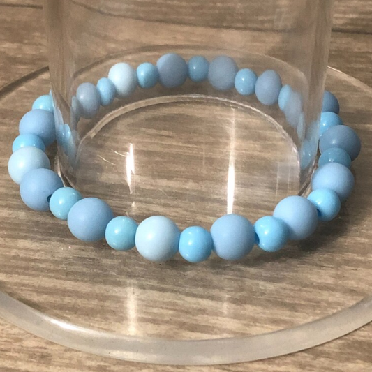 Blue beaded handmade stretch bracelet with round blue beads