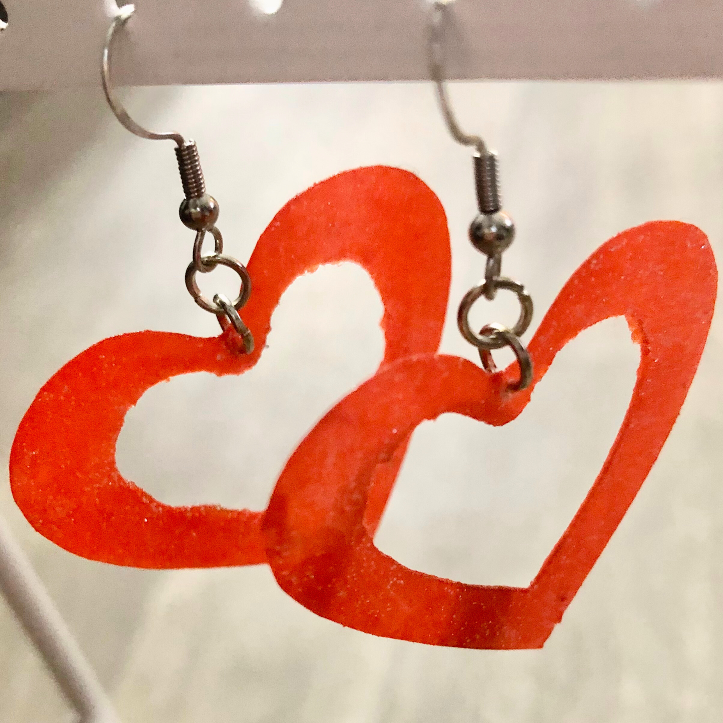 Handmade Orange Heart Earrings with Open Middle