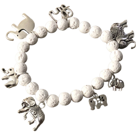 Charm bracelet with turtles and white lava beads