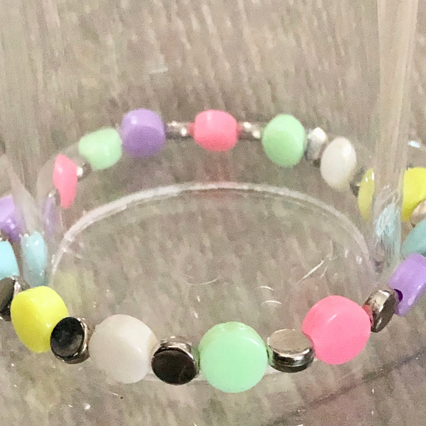 Colorful beaded bracelet with silver bead spacers available now