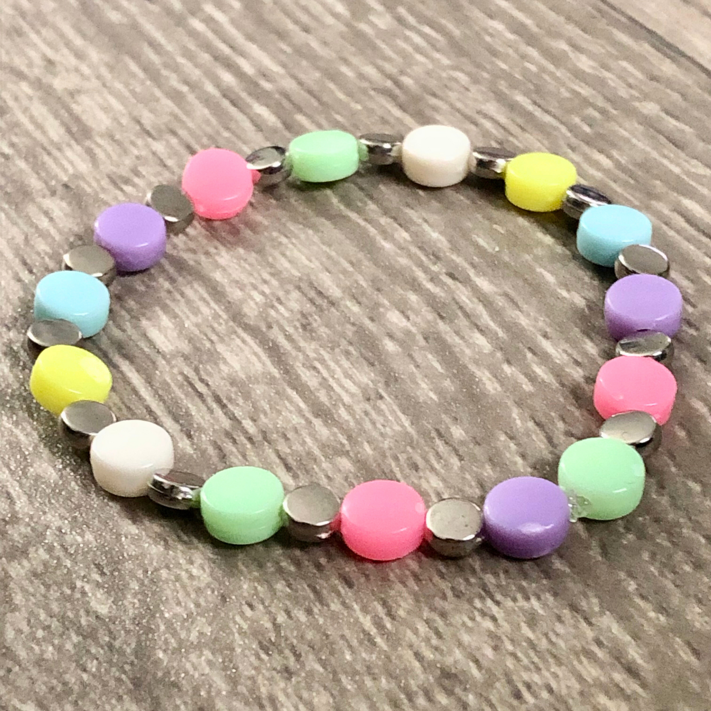 Colorful beaded bracelet with silver bead spacers available now