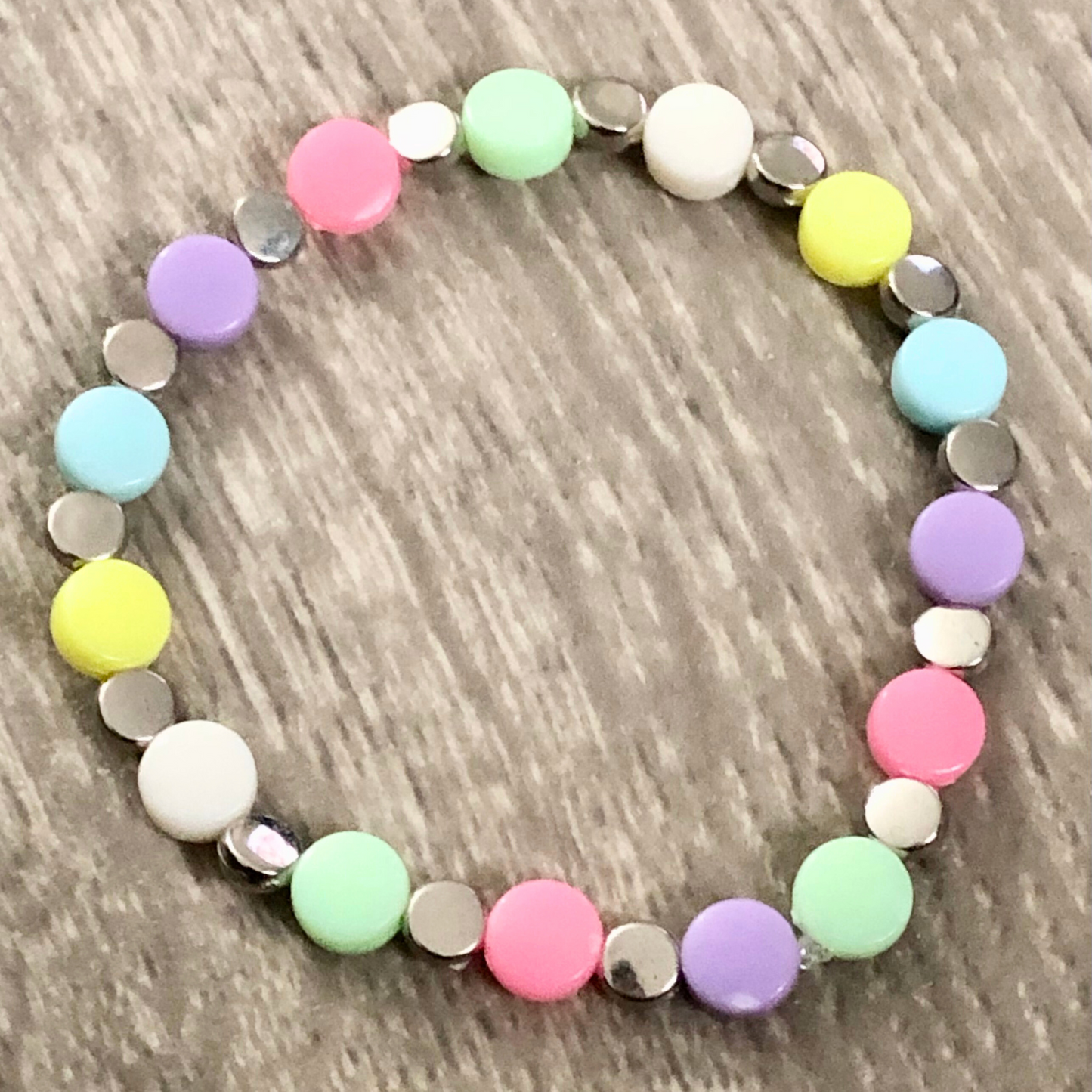 Colorful beaded bracelet with silver bead spacers available now