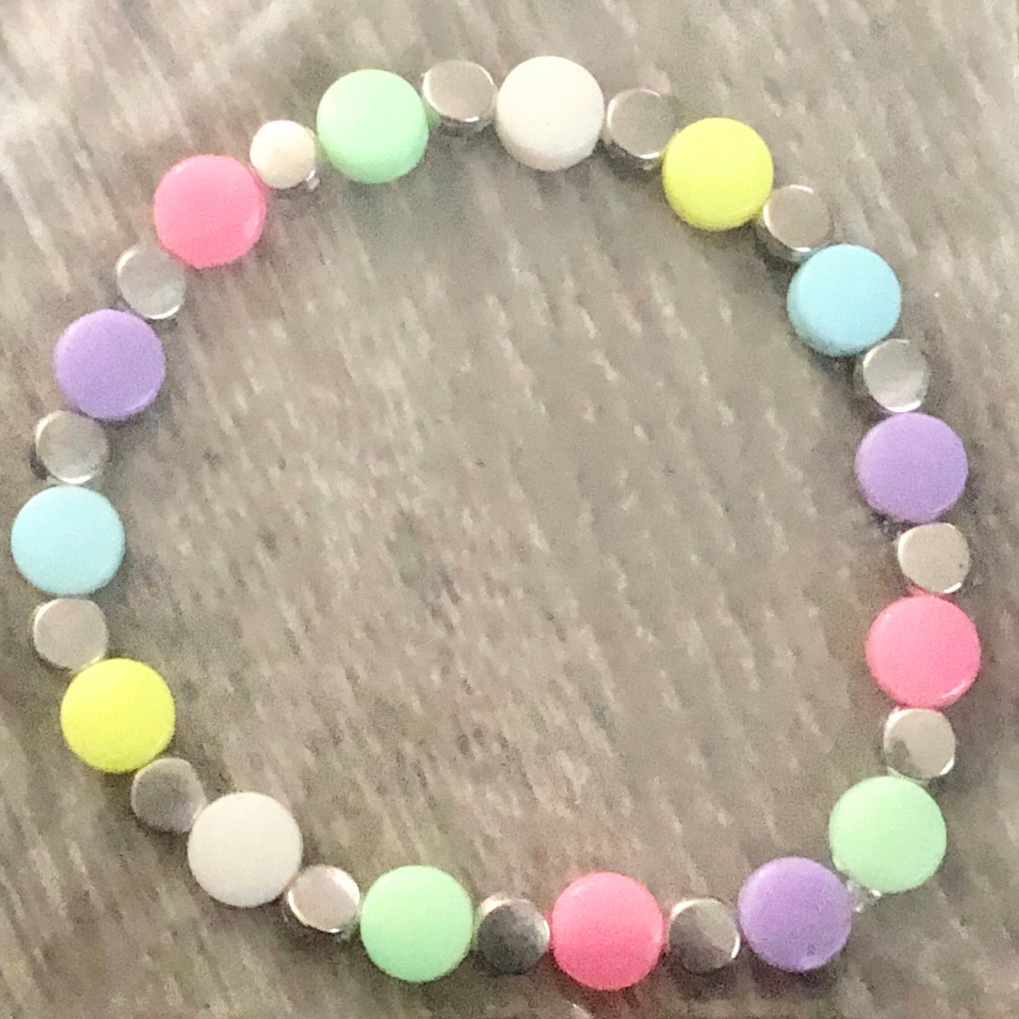 Colorful beaded bracelet with silver bead spacers available now