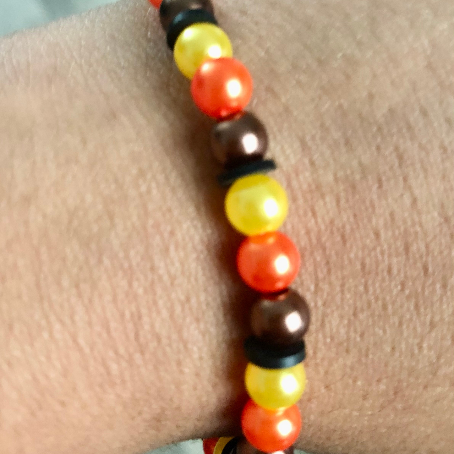 Fall color bracelets handmade with black clay bead spacers