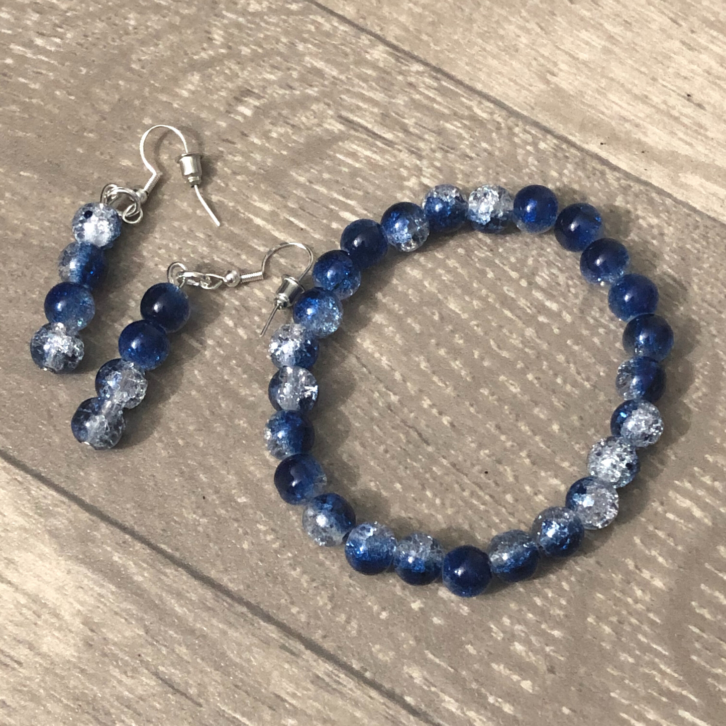 Drop earrings handmade with matching stretch bracelet and blue beads