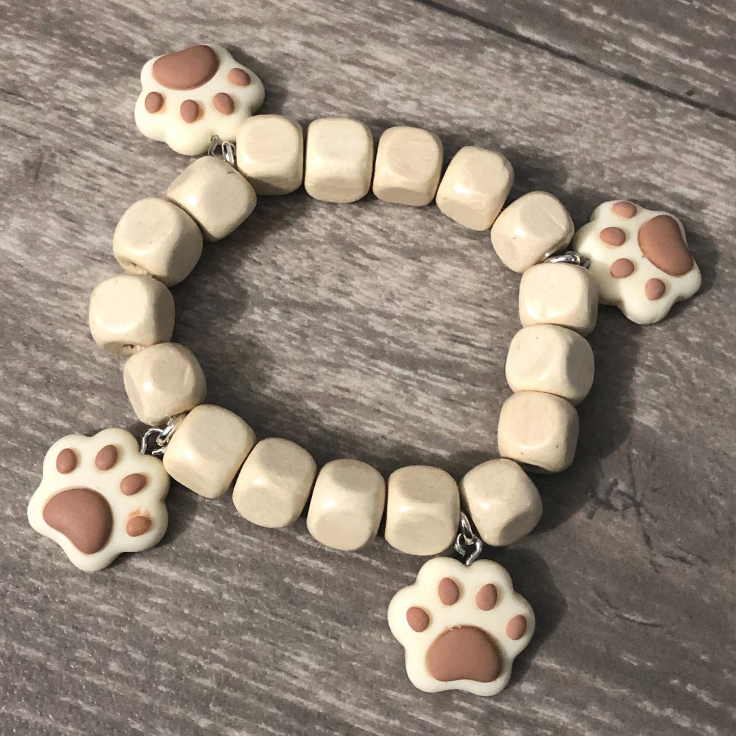 Dog paws earrings and dog paws bracelet handmade with wooden beads