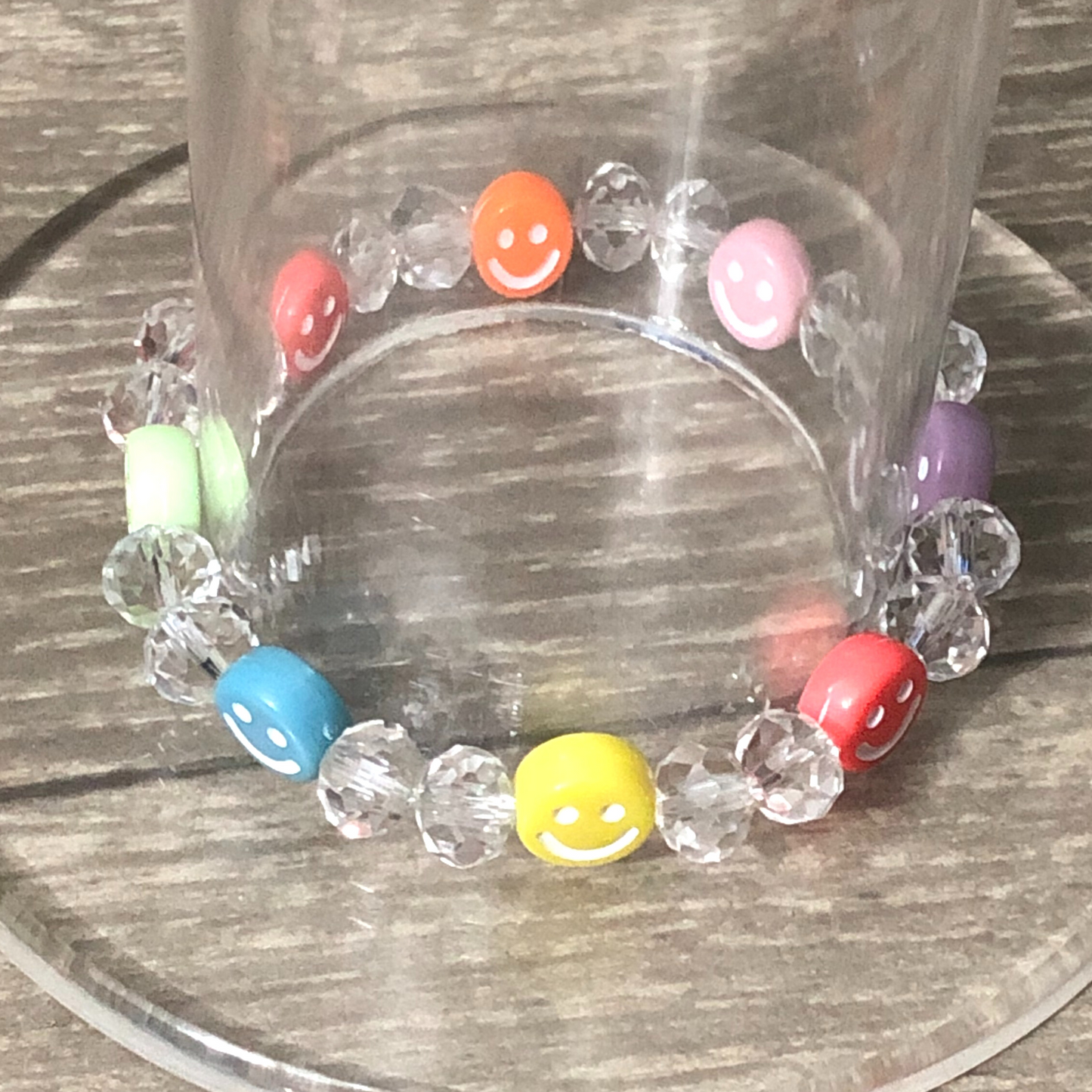 Colorful bracelet handmade with crystal beads and smiley faces