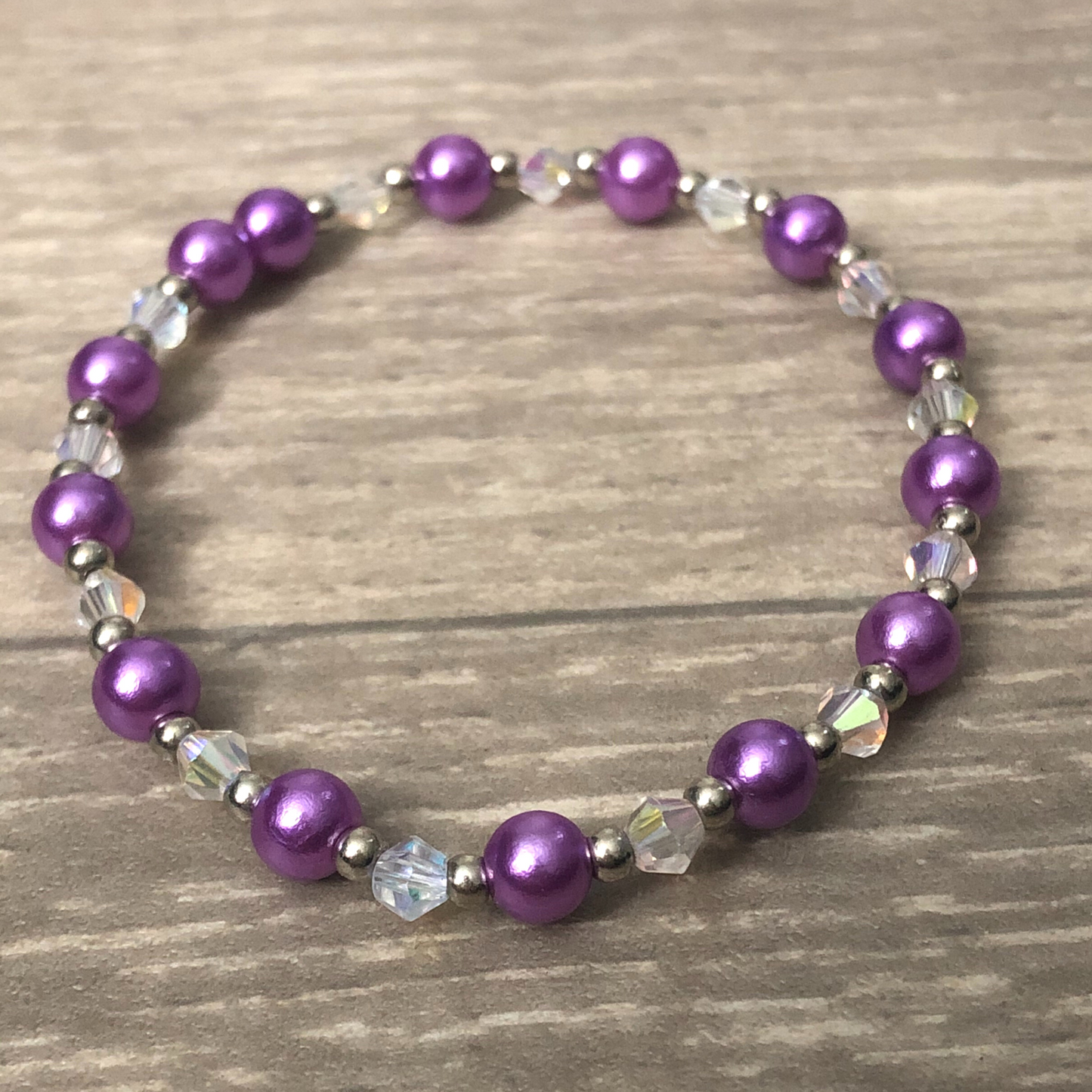 Purple handmade stretch bracelet with clear crystals