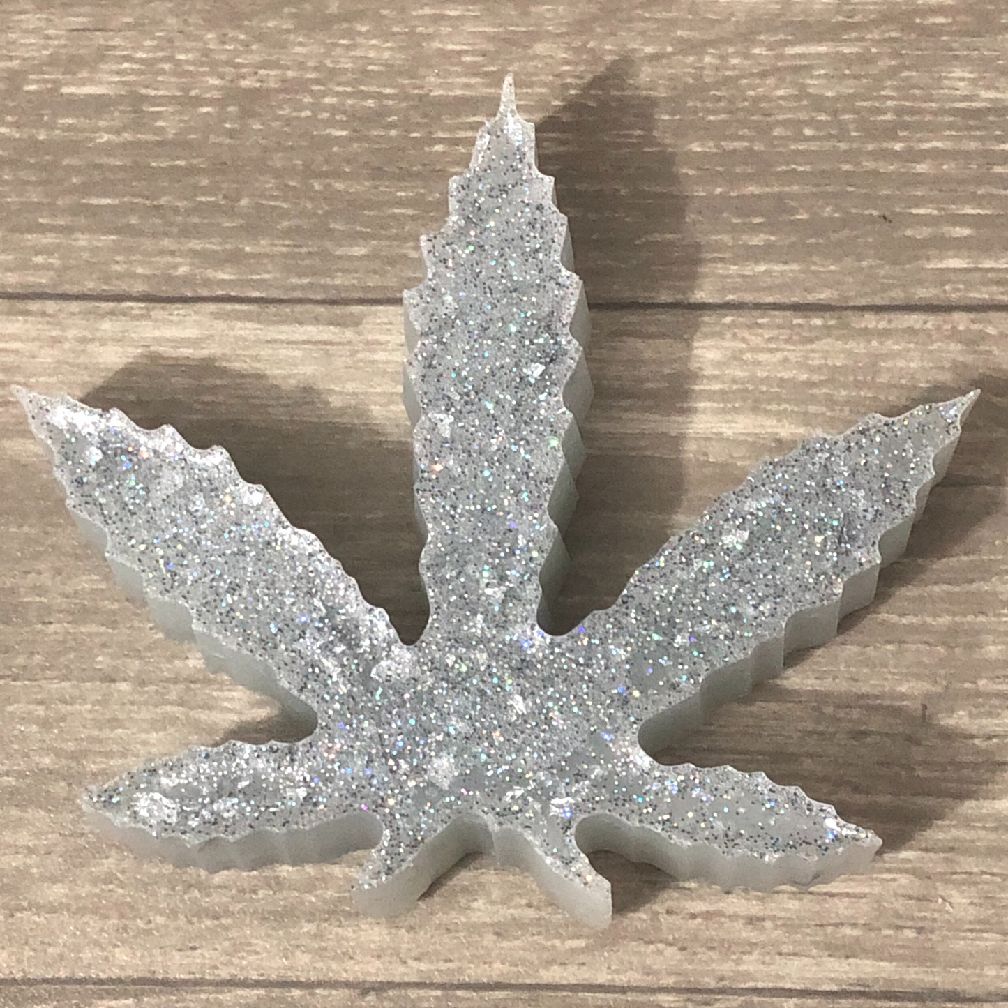 Large handmade leaf paper weight with silver glitter