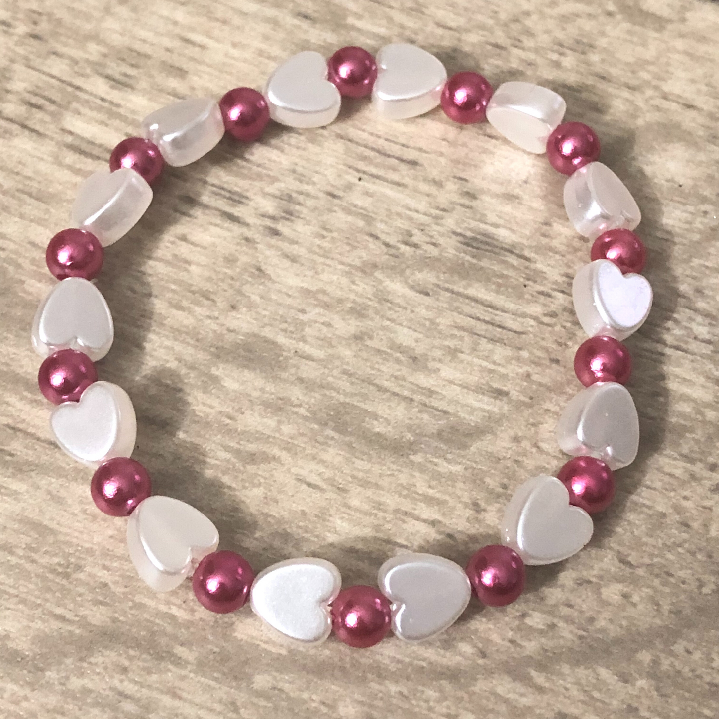 Faux pearl heart beaded stretch bracelet with pink beads