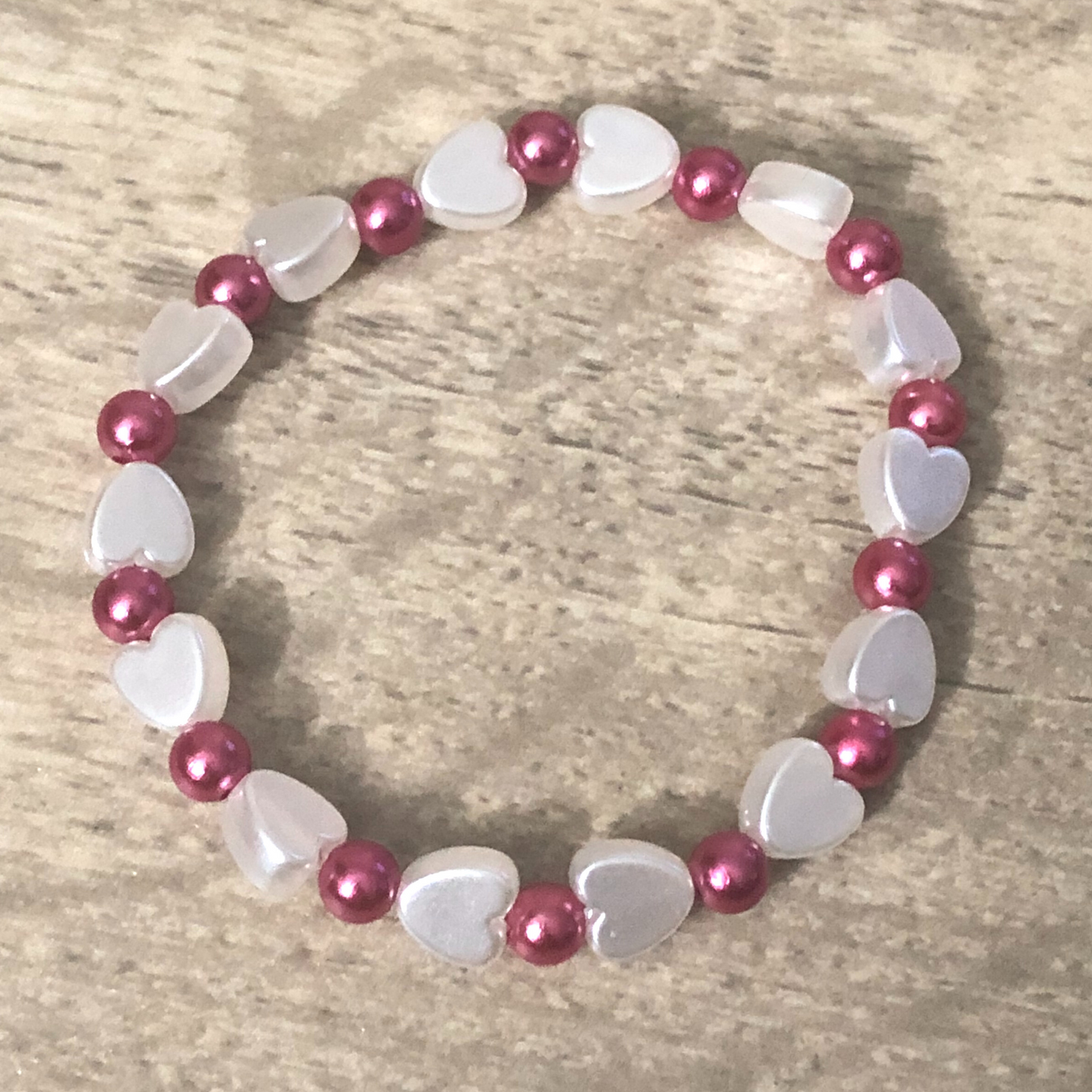 Faux pearl heart beaded stretch bracelet with pink beads